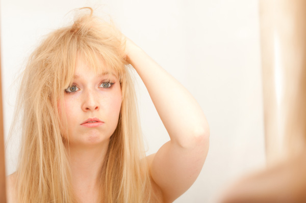 Woman finding a gray hair