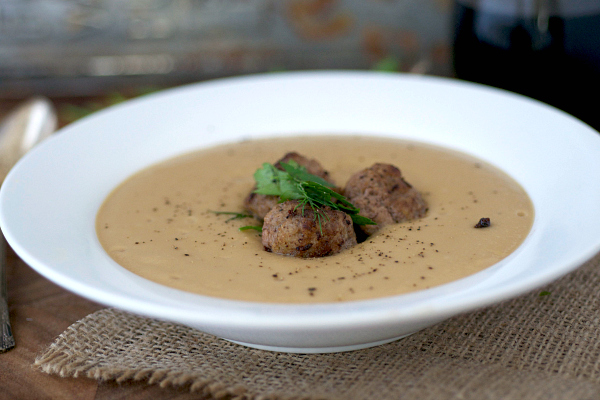 Garlic and parsnip soup with meatballs