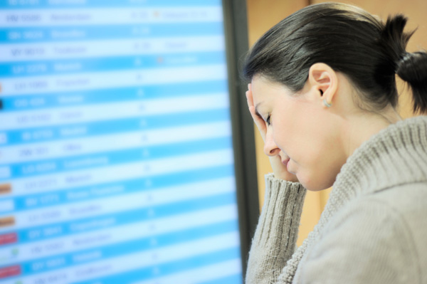 Stressed woman at airport