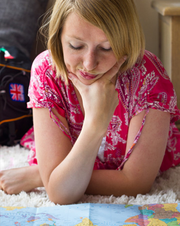 Woman looking at map