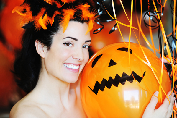 Woman throwing Halloween party