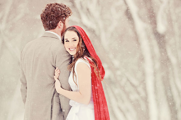 Bride and groom standing in winter wonderland | Sheknows.ca