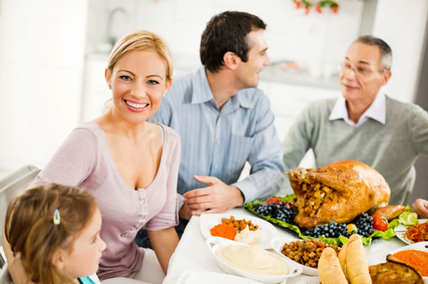 Woman celebrating Thankgiving with family