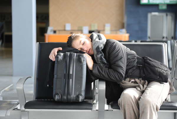 Tired woman at airport