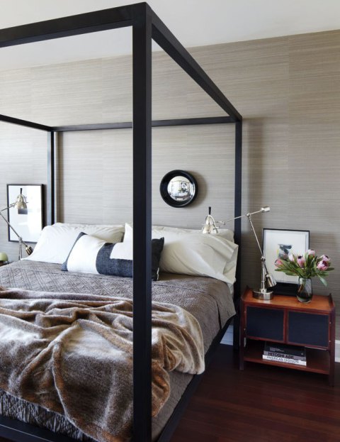 Bedroom with wood pallet wall