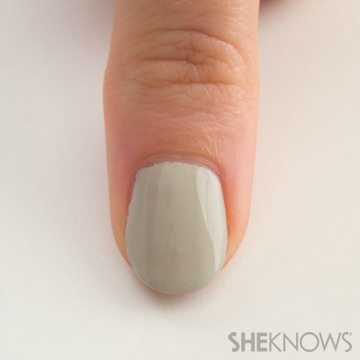 A nail design outlined in stitches