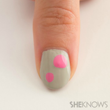 A nail design outlined in stitches