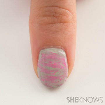 A nail design outlined in stitches