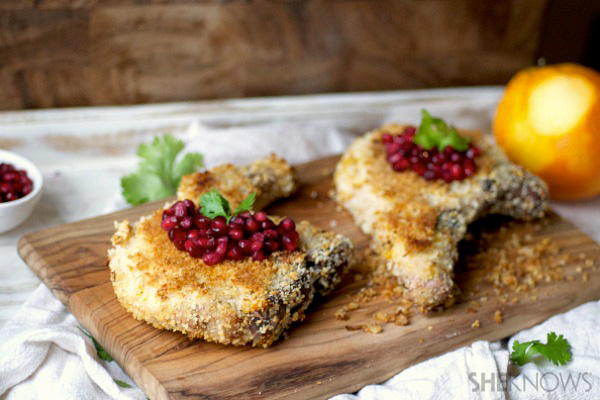 Orange crusted crispy pork chops with bourbon soaked pomegranate seeds