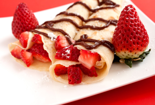 Crepes with strawberries & whipped cream