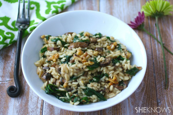 Vegan spinach and mushroom risotto with toasted walnuts