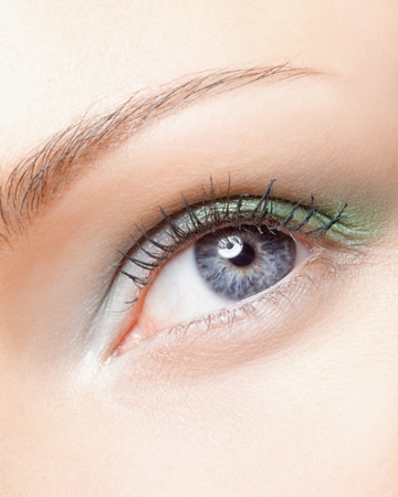 Woman wearing green eyeshadow