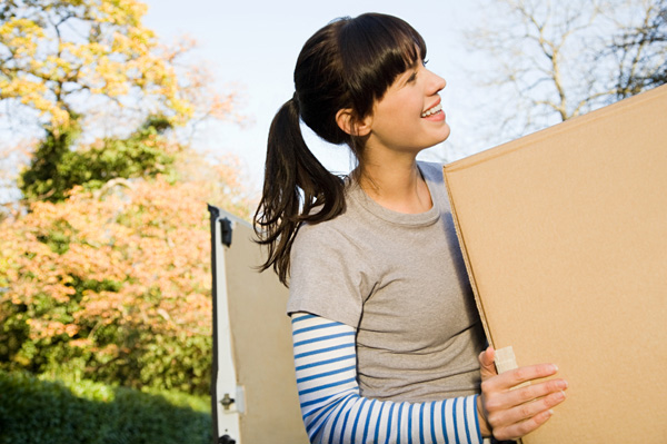 Woman moving boxes