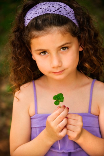 Grade school girl with clover | Sheknows.com