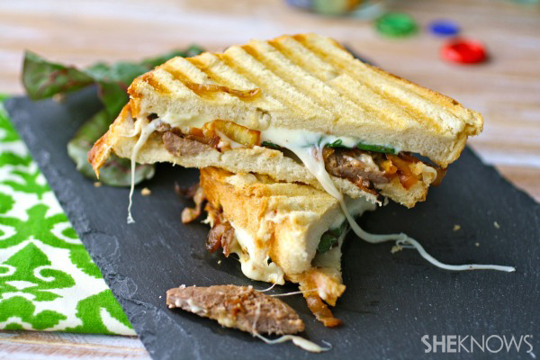 Caramelized onion, steak & Swiss chard panini