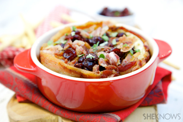 Bacon-wrapped baked Brie with thyme and cranberry sauce