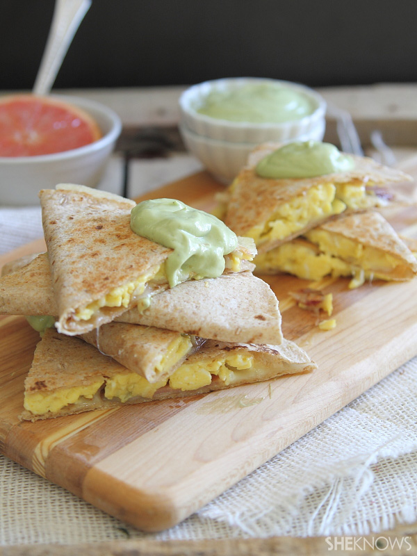 Bacon egg and cheese quesadilla stacks with avocado hollandaise sauce