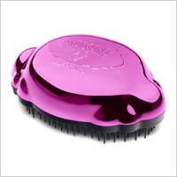 Knot Genie Peaceful Pink Knot Genie Brush (knotgenie.com, $20)
