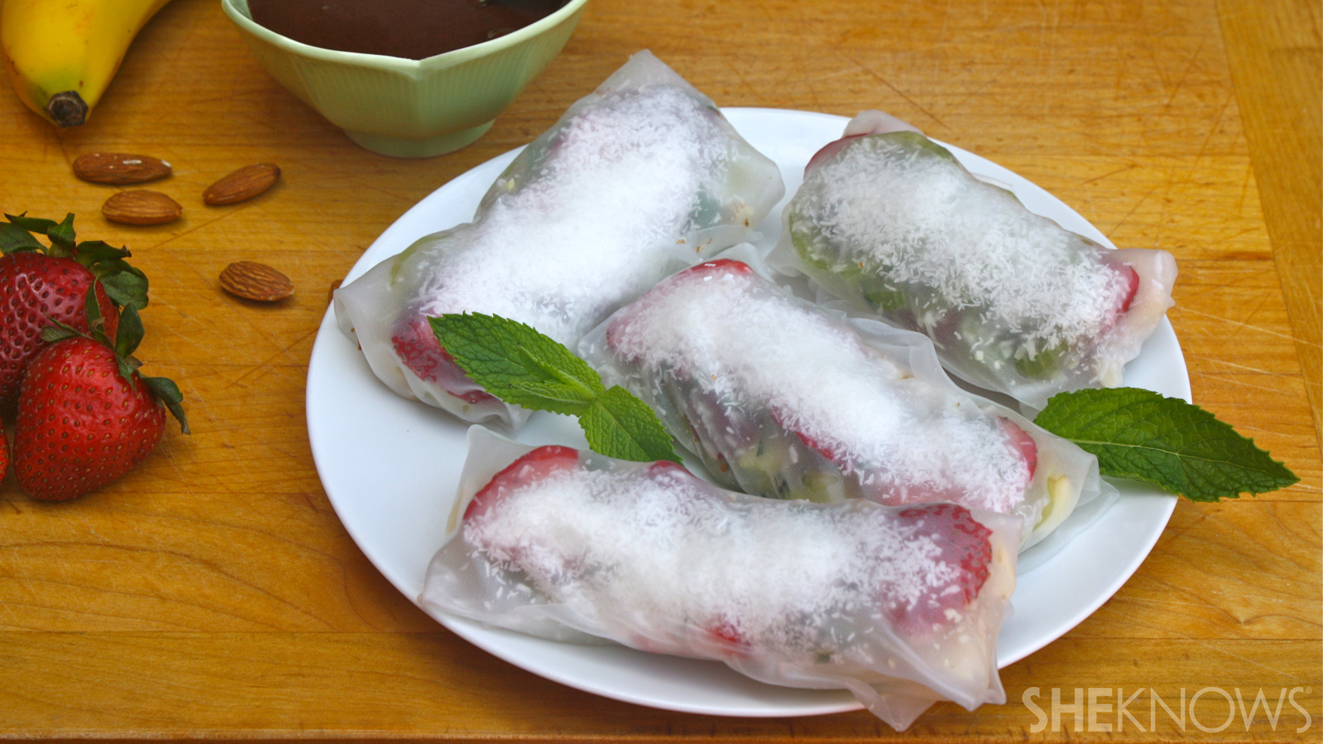Vegan strawberry, banana & almond spring rolls with chocolate sauce