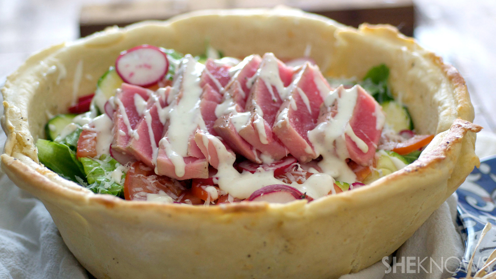 Ahi tuna cesear salad in a crispy bread bowl