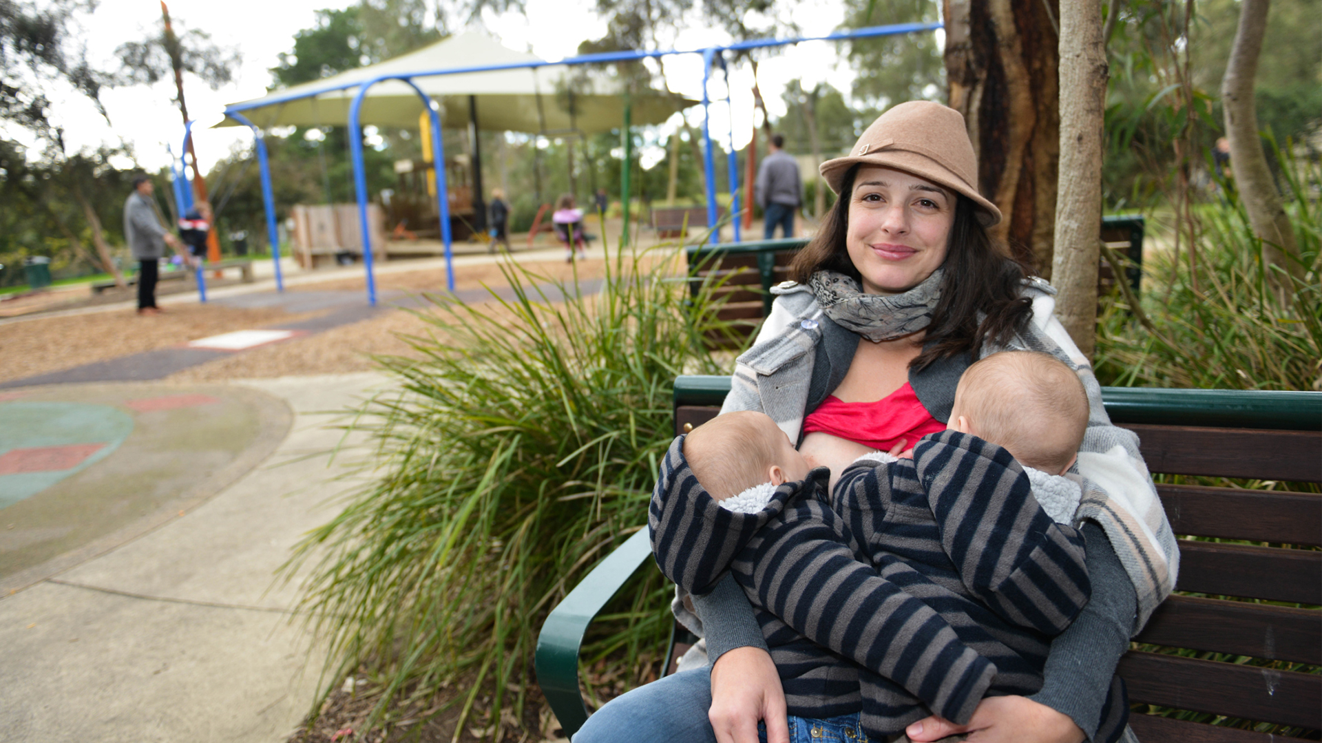 mother-breastfeeding-at-park.jpg