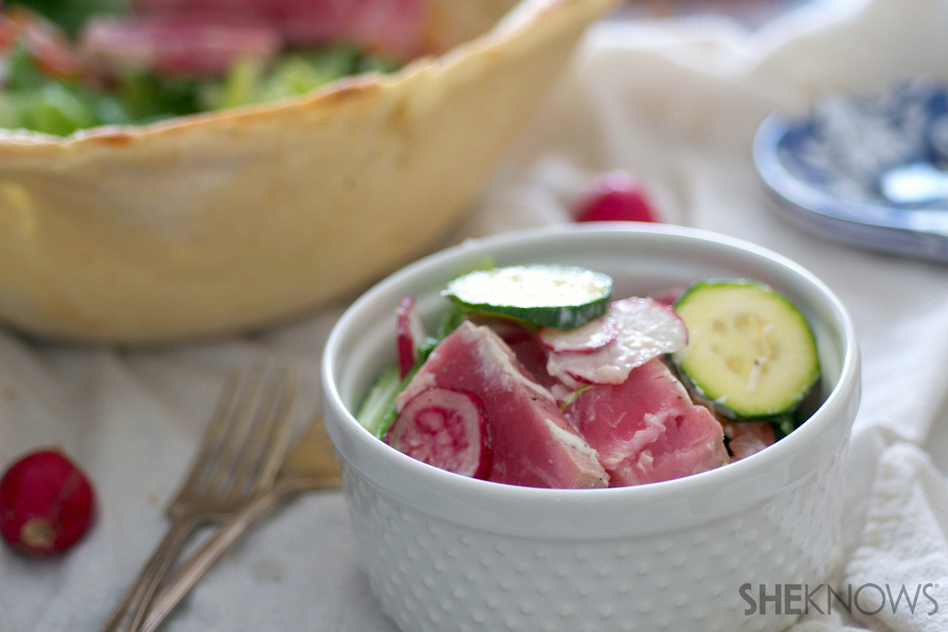Ahi tuna cesear salad in a crispy bread bowl