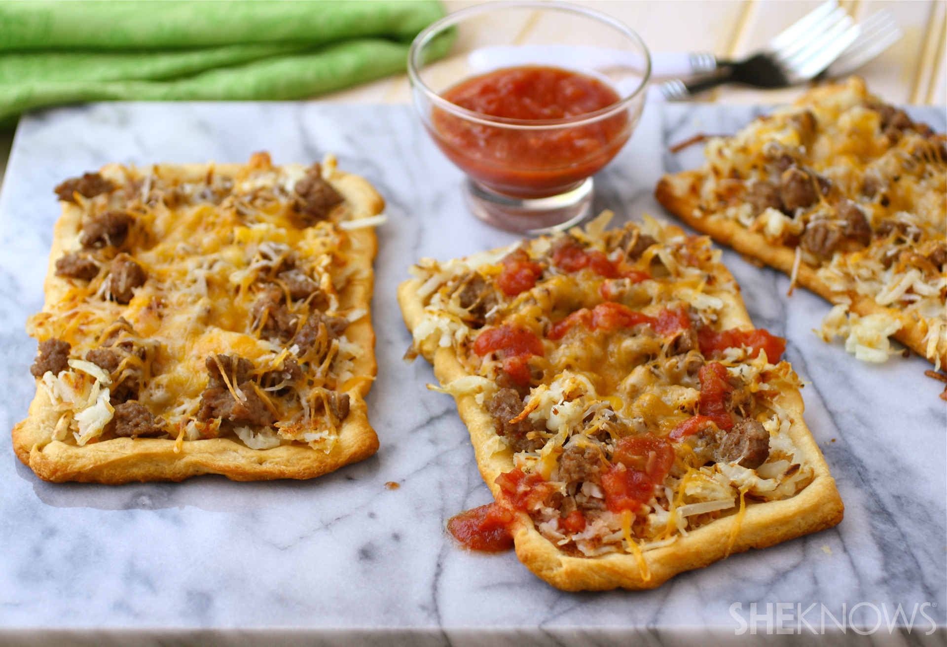 Cheesy sausage and hash brown pizza