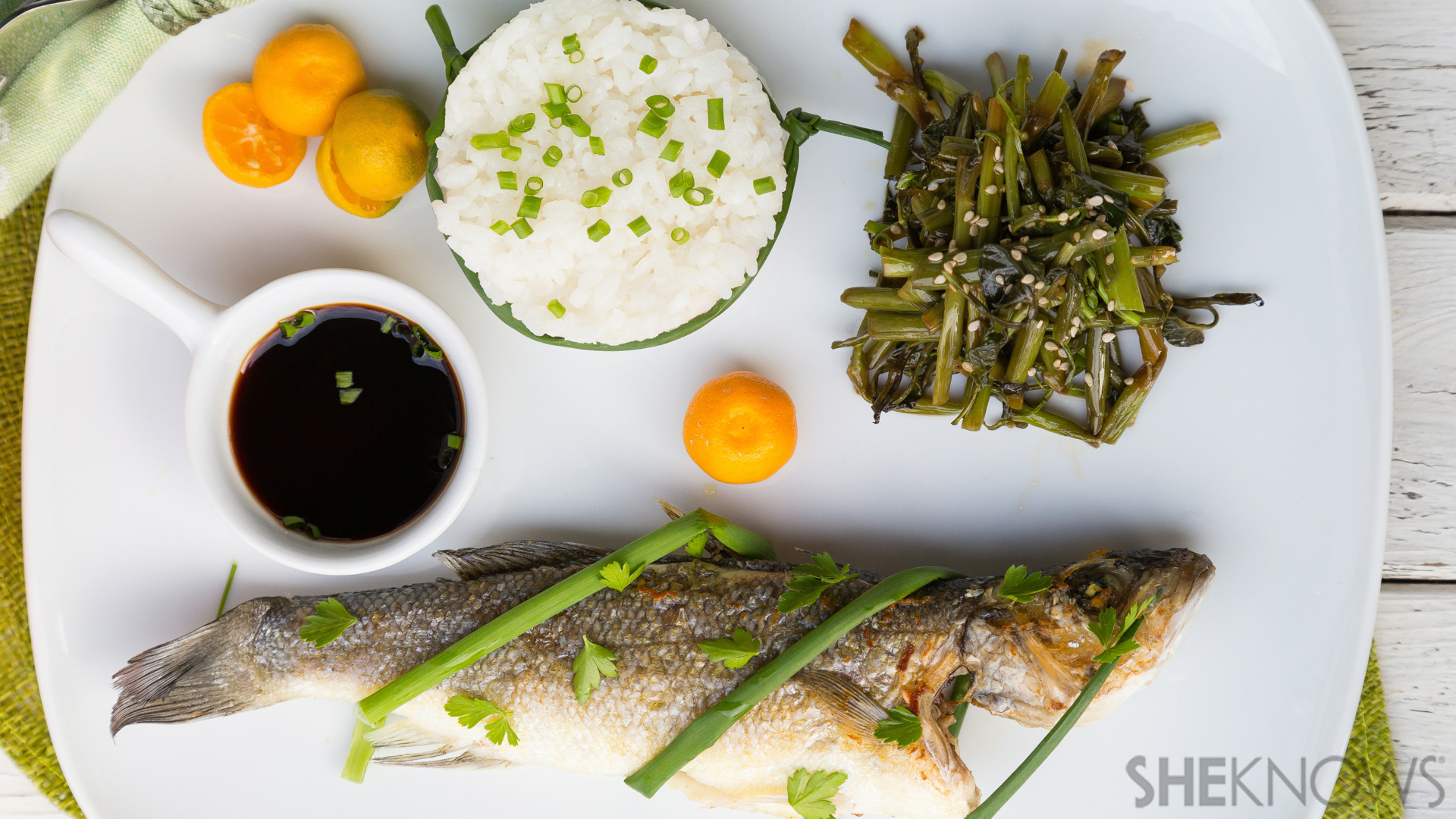 Asian meal: Fried whole fish, adobo water spinach and steamed rice