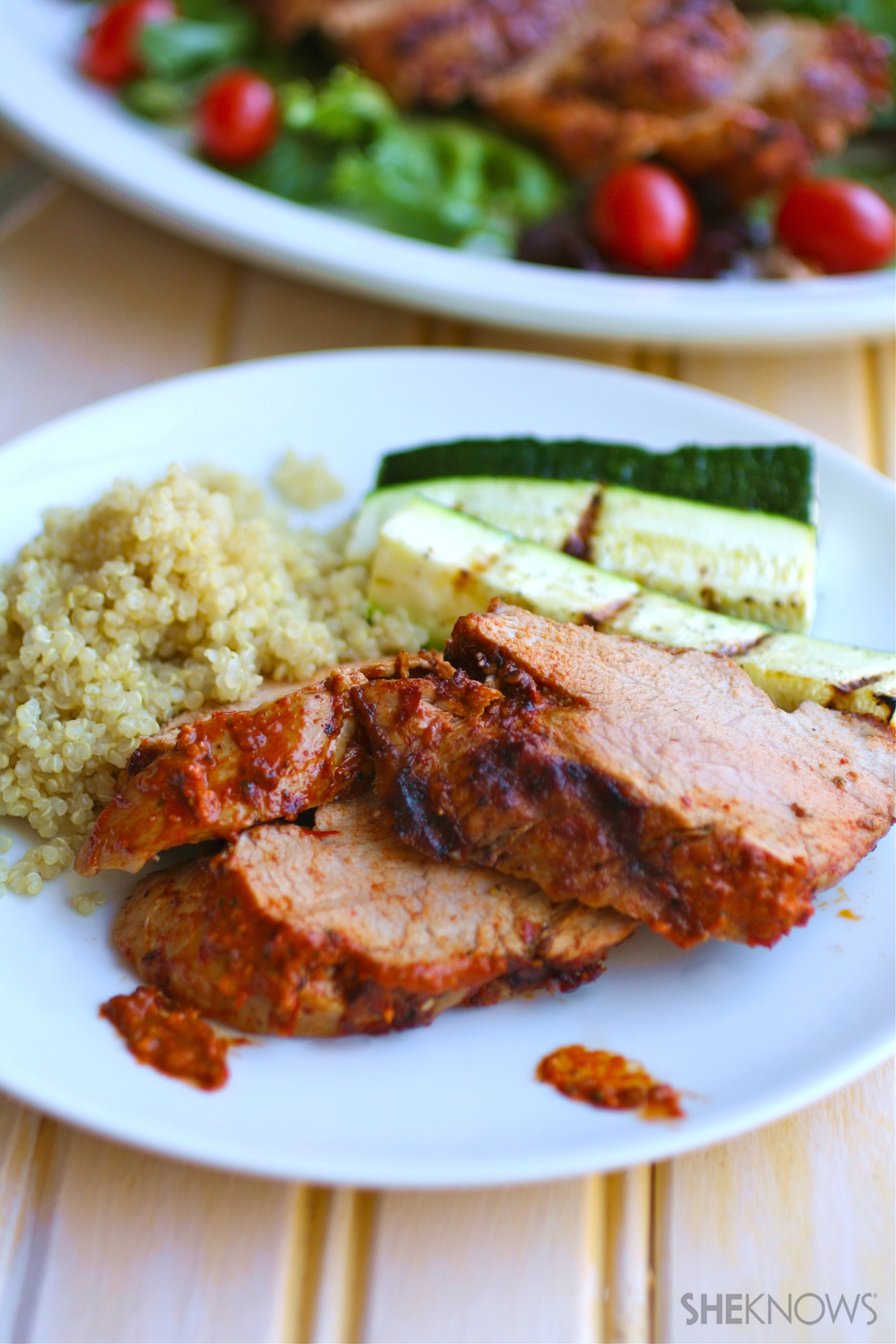 Grilled pork tenderloin with spicy harissa paste