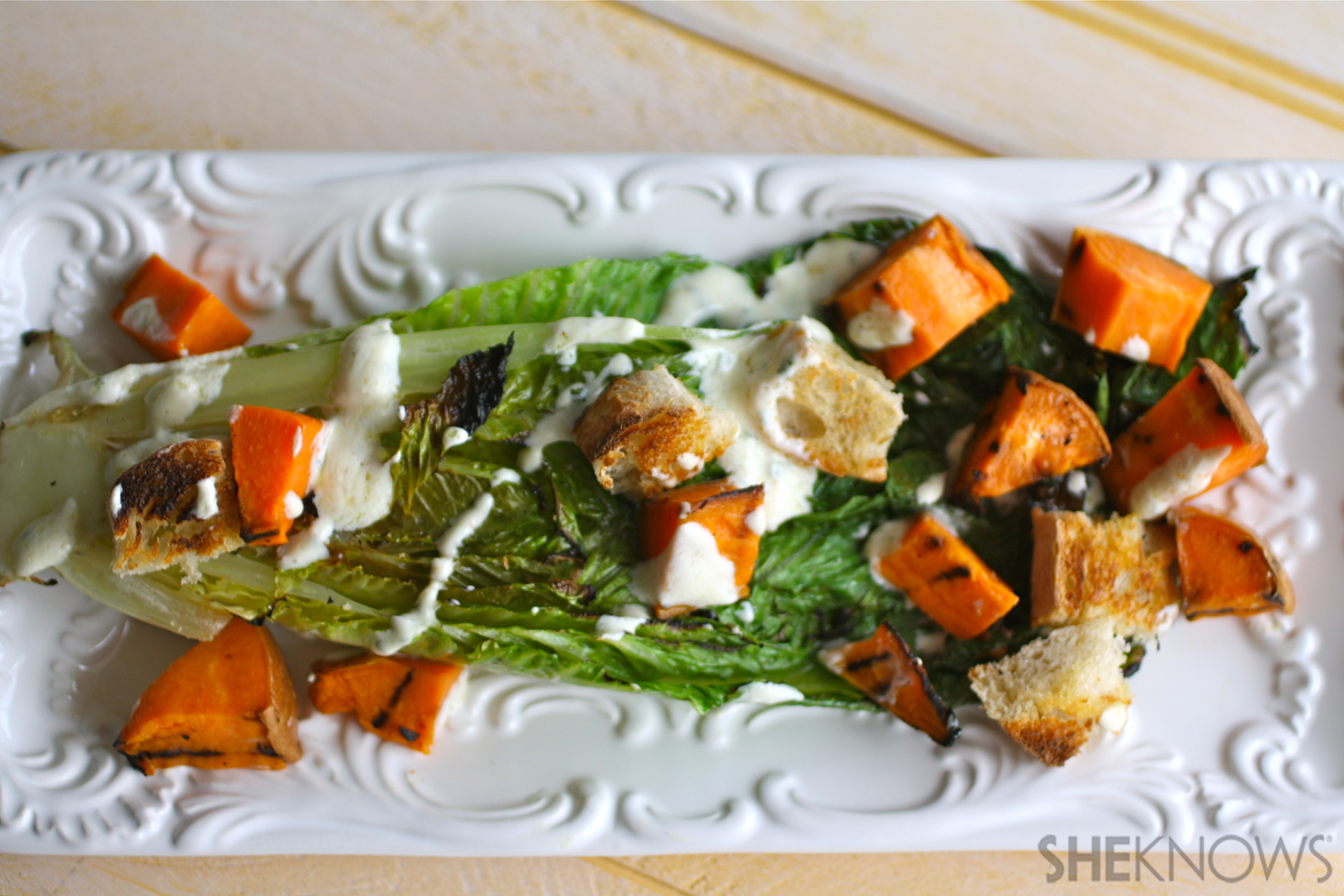 Grilled Romaine and sweet potato salad with creamy cilantro dressing