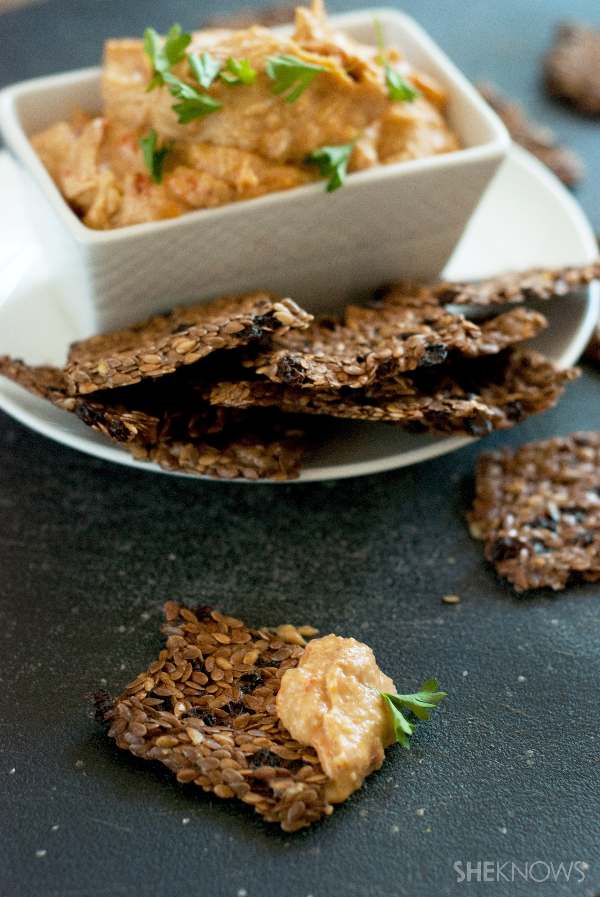 Make these easy homemade flaxseed crackers with creamy vegan cheese dip