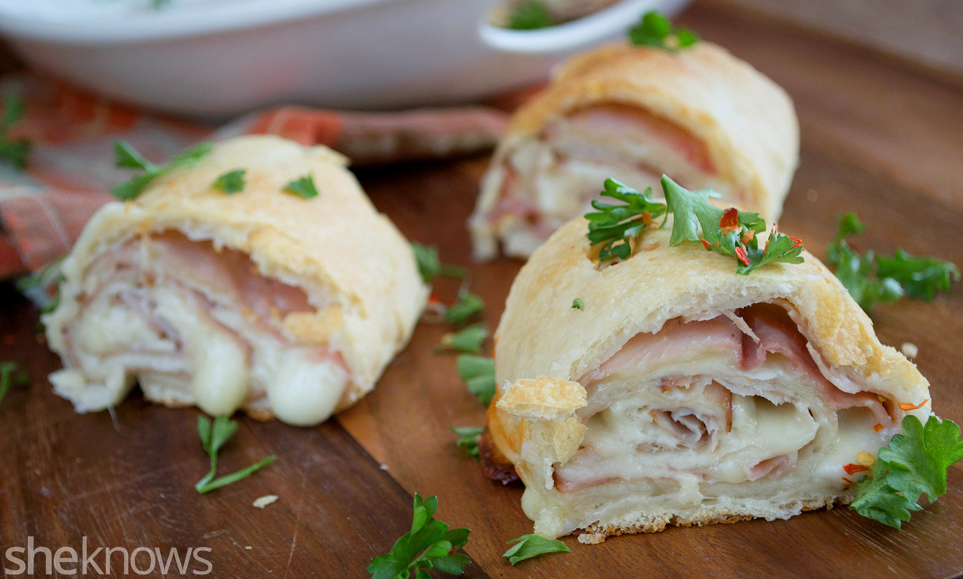Baked ham and Swiss cheese rolls are a snack kids will love