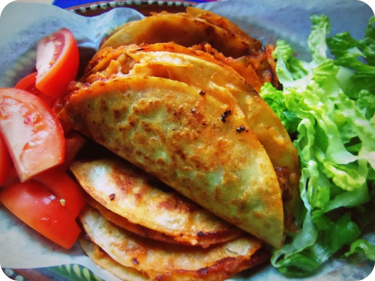 Tacos de Canasta Filled with Spicy Potatoes and Cheese