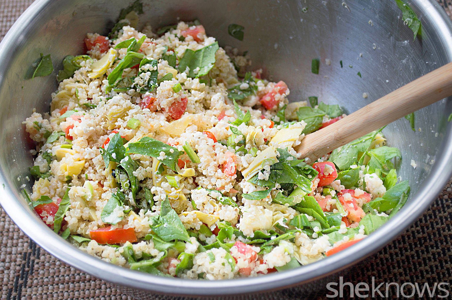 Make quinoa salad irresistible with artichoke hearts and feta cheese