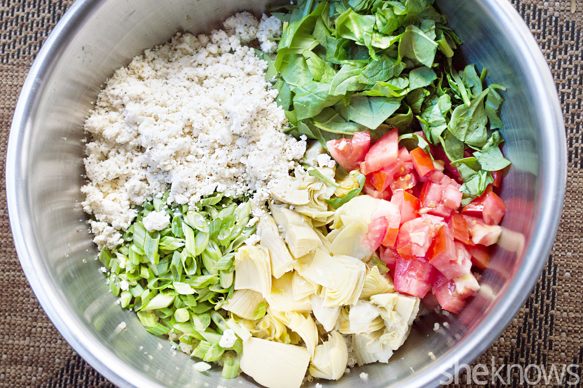 Make quinoa salad irresistible with artichoke hearts and feta cheese