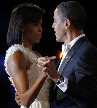 Michelle dancers with her man, our President