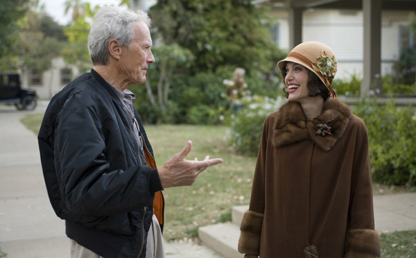 Eastwood and Jolie share a light moment on the set of The Changeling