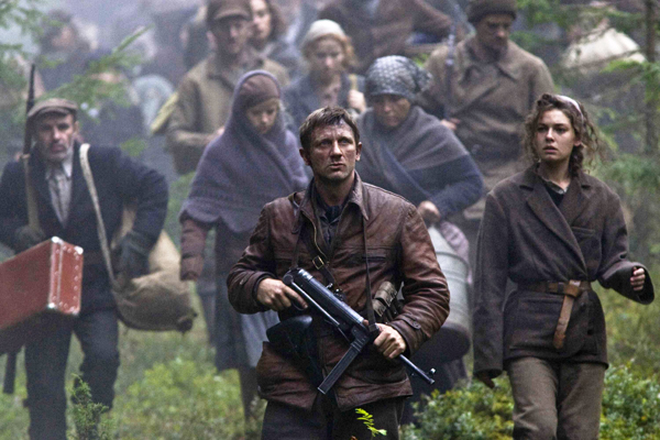 Daniel Craig leads refugees to safety