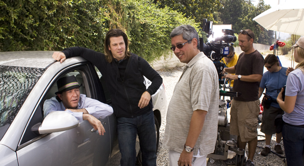 Hutton, Kane and director Devlin get ready to film a Leverage scene