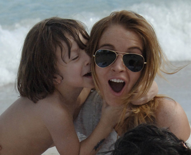 Lindsay Lohan entertains a fan in Miami