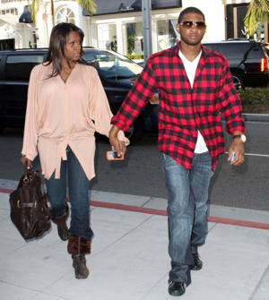 Usher and his wife out for a stroll