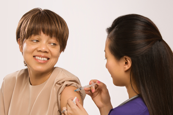 Adult woman getting vaccine