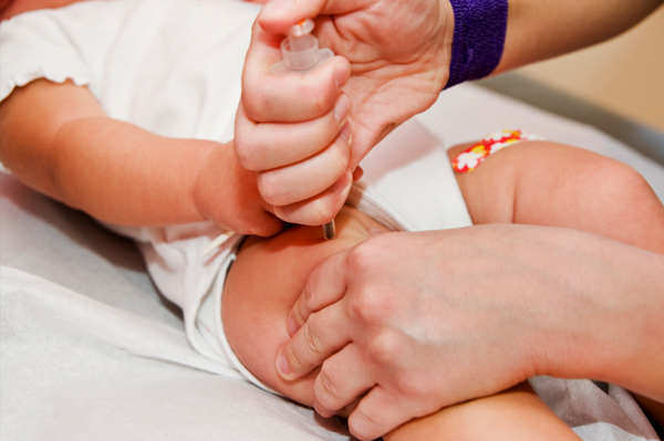 Baby getting vaccine