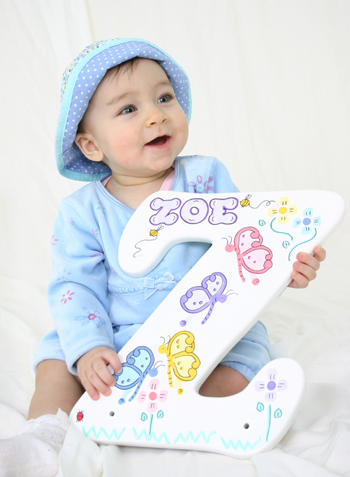 Baby holding letter z