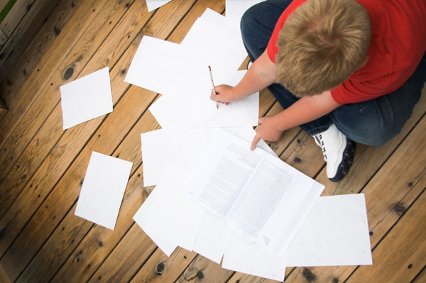 Boy with messy papers