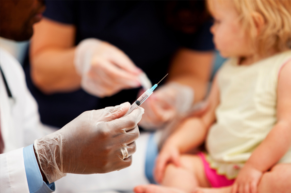 Child at doctor's office getting vaccine