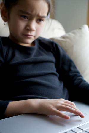 Sad Child on Computer