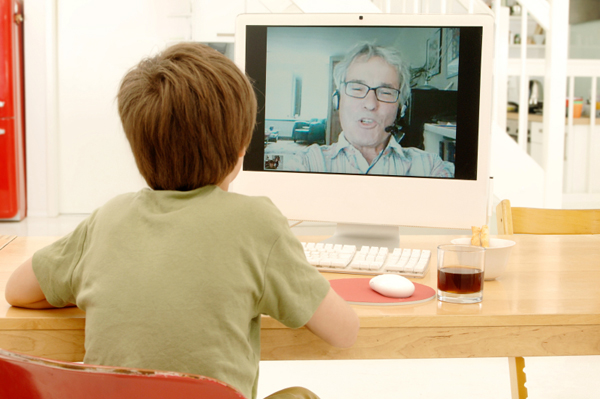 Child web-caming with father