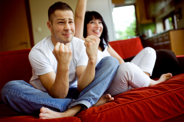 Couple Watching Sports on TV