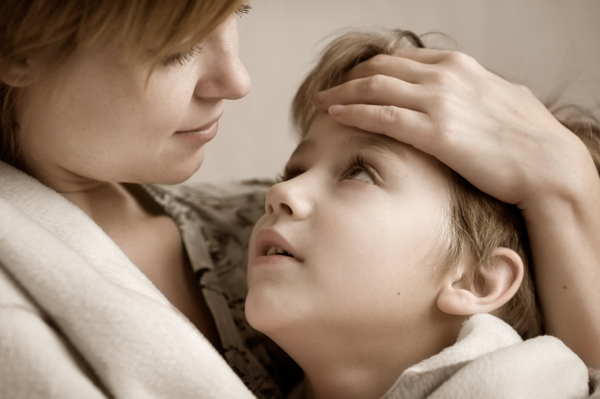 Mom Holding Sick Child
